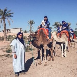morocco-camel-girl-palmtrees-800×493
