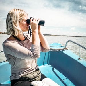 girl boat birdwatching morocco