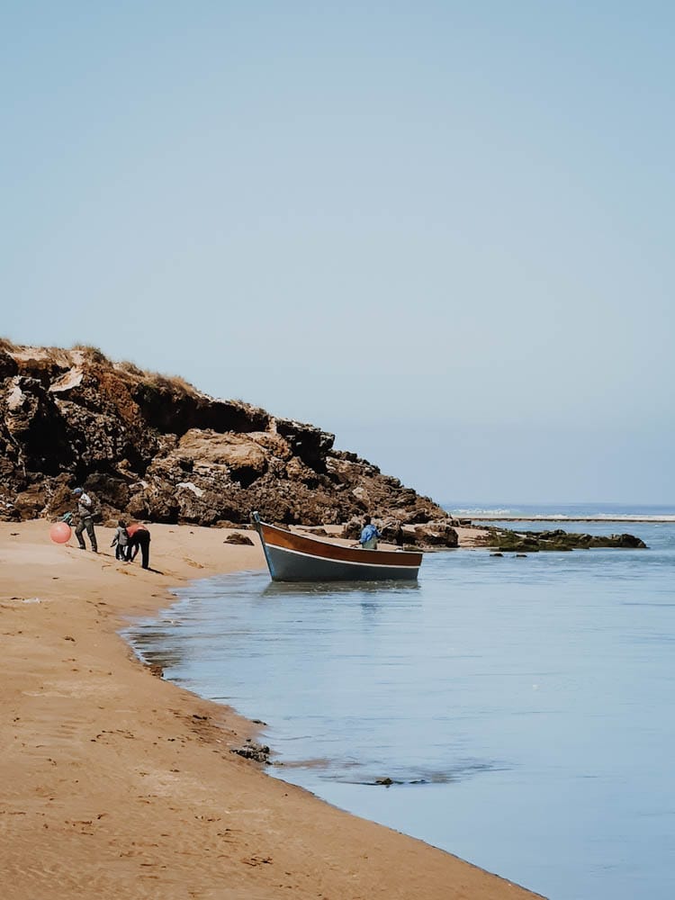 beach morocco sand water birdwatching boat